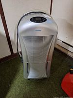 Front of silver Danby dehumidifier showing control panel and grill