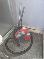 Full view of Royal SD40125 canister vacuum with hose and wands