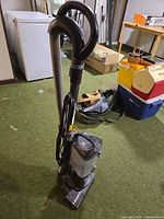 Front angle of Shark Navigator Lift-Away vacuum showing full unit and cord