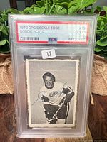 Front of PSA-slabbed Gordie Howe Deckle Edge card showing grade label and autograph