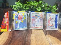 Three sealed 1989 Fleer rack packs side by side