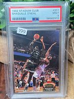 Front of PSA-slabbed Shaquille O'Neal rookie card with label showing PSA 9 and cert 58582972