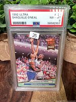 Front of PSA-slabbed 1992 Ultra Shaquille O'Neal rookie card #23 showing grade label NM-MT 8
