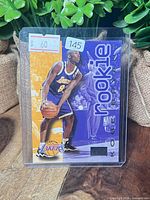 Front of Kobe Bryant SkyBox rookie card in sleeve