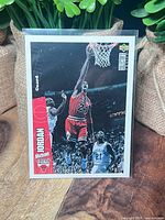 Front of sleeved 1996 Upper Deck Michael Jordan card