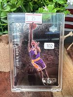 Front view of Kobe Bryant Black Diamond card in holder