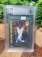 Front of slabbed autographed card showing Beckett label, signature and card image