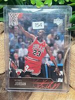 Front of sleeved Michael Jordan Upper Deck card #299