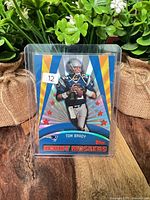 Front of 2006 Topps Hobby Masters Tom Brady insert card in toploader