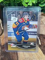 Front of McDavid rookie card in protective case
