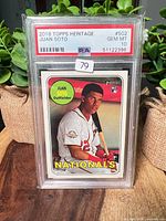 Front view of encapsulated 2018 Topps Heritage Juan Soto card showing PSA label and grade