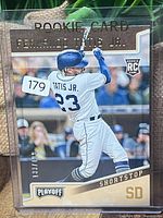 Front of Fernando Tatis Jr. Panini Playoff rookie card in top loader
