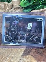 Front view of sleeved Lewis Hamilton Topps Chrome refractor card