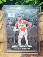 Front view of Victor Wembanyama City Edition rookie card in sleeve