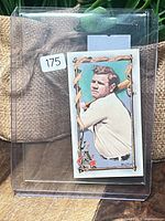 Front view of Babe Ruth mini card inside clear toploader