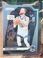 Front of Stephen Curry Panini Prizm card in top-loader