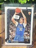 Front view of sleeved Cooper Flagg Topps rookie card