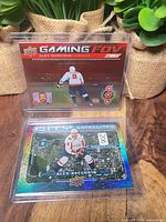 Front of both Alex Ovechkin cards in sleeves: Gaming FOV top, City Satellites bottom