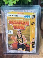 Front view of Caitlin Clark Crunch Time card in plastic holder