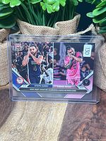 Front view of the dual Steph Curry and Lionel Messi card in top loader