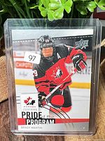 Front of Brady Martin Upper Deck Pride of the Program card in top loader