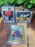 All three George Springer Topps cards in protectors