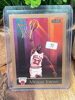 Front of 1990 SkyBox Michael Jordan card in holder