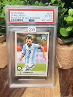 Front of PSA-slabbed Lionel Messi sticker showing grade label and card front