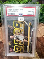 Front of PSA-slabbed Caitlin Clark Bowman U Now card