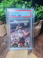 Front view of encapsulated Shaquille O’Neal Topps Stadium Club card showing PSA label and card image