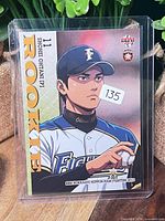 Front view of Shohei Ohtani rookie card in top-loader