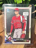 Front of custom Bowman Chrome style Ohtani card in top loader
