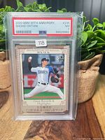 Front of PSA-slabbed Shohei Ohtani BBM card showing grade label and card image