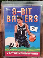 Front of sleeved Topps 8-Bit Ballers Victor Wembanyama card