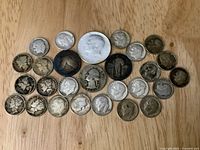 All coins laid out, showing denominations and overall quantity