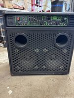Full view of Trace Elliot GP7SM 200 amplifier cabinet, grille, ports, control panel