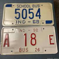 Both license plates side by side showing full view