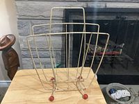 Full view of wire magazine rack front side