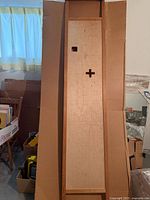 Full view of wooden divider panel in packing cardboard