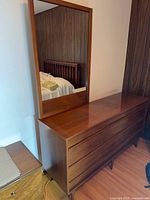 Front view of dresser with mirror