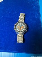 Front view showing dial, case and bracelet