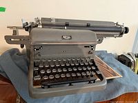 Front view showing entire Royal typewriter with wide carriage and key layout