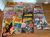 All comics laid out showing titles and condition