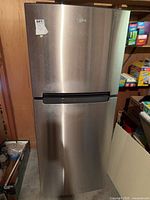 Full closed view of refrigerator showing stainless exterior