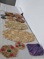 All coasters and trivets laid out showing shapes and sizes