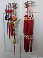 Full view of all hanging ornaments on two door handles