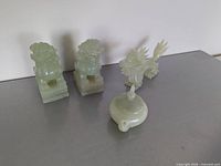 Group shot of dragon, Fu dogs and teapot