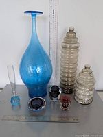 All seven glass pieces group shot for scale