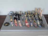 Top view of full collection of miniature shoes and accessories