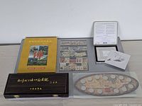 Overview of all coin and stamp sets with boxes and holders